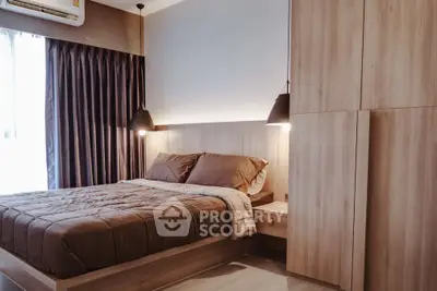 Modern bedroom with wooden furniture and cozy lighting, featuring a comfortable bed and stylish decor.