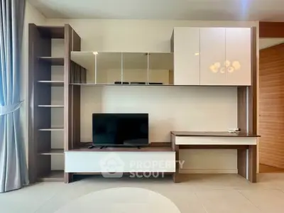 Modern living room with sleek TV unit and elegant decor