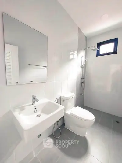 Modern bathroom with sleek fixtures and natural light