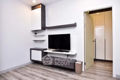 Modern living room with sleek TV unit and stylish flooring