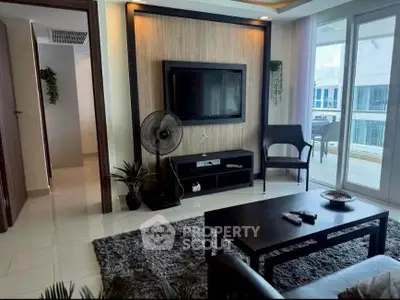 Modern living room with sleek furniture and large windows offering abundant natural light.