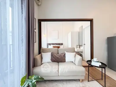 Modern living room with cozy sofa and elegant decor