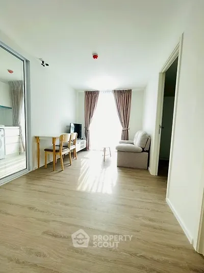 Bright and airy living room with modern furnishings and natural light