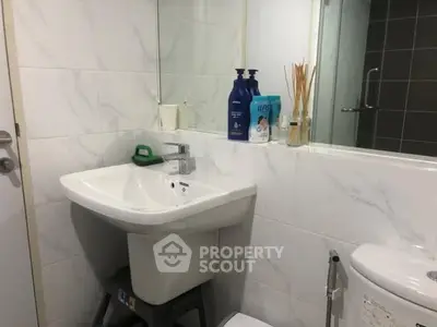 Modern bathroom with sleek sink and stylish decor