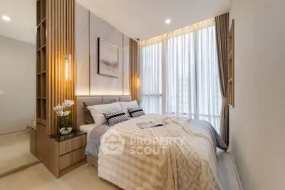 Luxurious modern bedroom with elegant decor and large window view