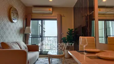 Stylish living room with balcony and modern decor in urban apartment