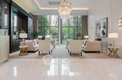 Luxurious living room with elegant chandelier and garden view, featuring plush seating and modern decor.