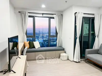 Modern living room with stunning city view and cozy seating area