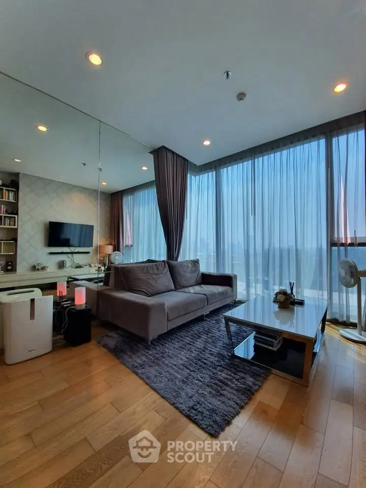 Modern living room with panoramic windows and stylish decor