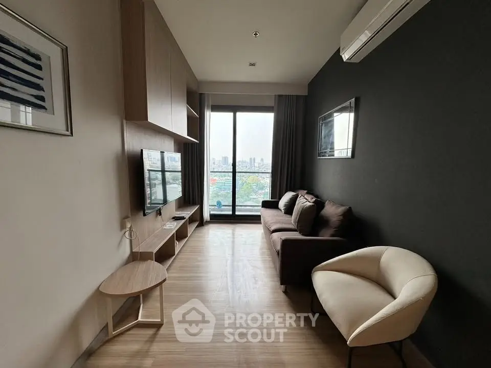 Modern living room with city view, featuring sleek furniture and wall-mounted TV, perfect for urban living.