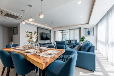 Luxurious modern living room with elegant dining area and stylish decor
