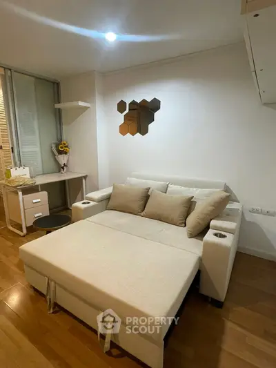 Cozy living room with modern sofa bed and stylish decor