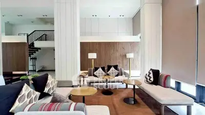 Spacious modern living room with stylish furniture and elegant decor