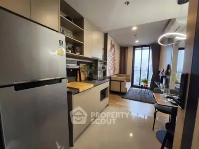 Modern open-plan kitchen and living area with stylish decor and city view.