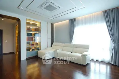 Spacious modern living room with elegant decor and natural light