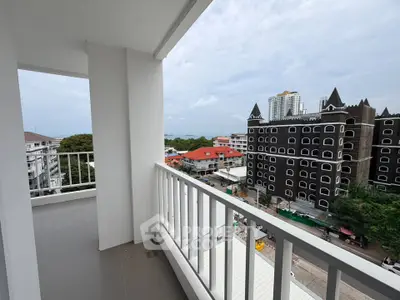 Spacious balcony with city view in modern apartment building