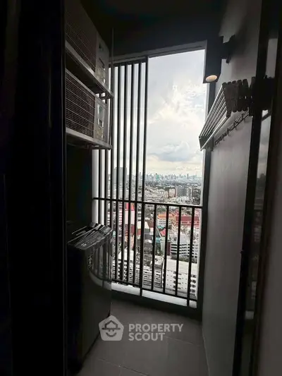 High-rise balcony with stunning cityscape view and modern design.
