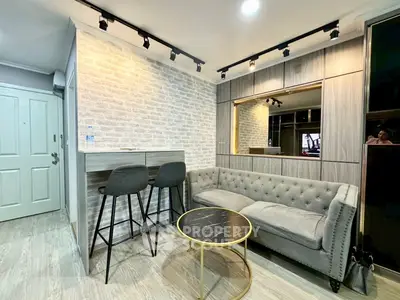 Stylish modern living room with chic decor and cozy seating area