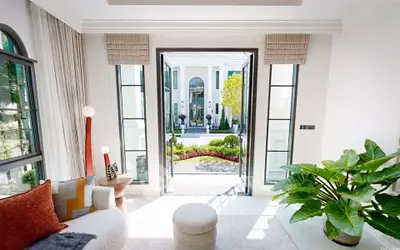 Luxurious living room with garden view and elegant decor