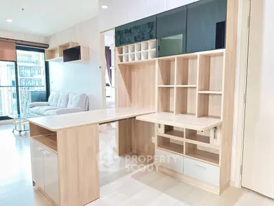 Modern living room with stylish wooden furniture and ample natural light