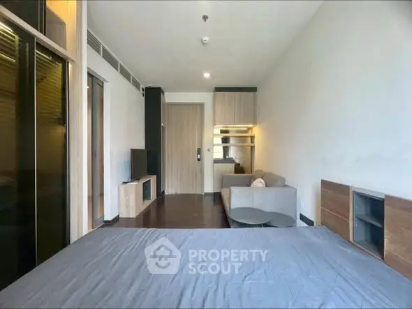 Modern studio apartment with sleek design and cozy living area