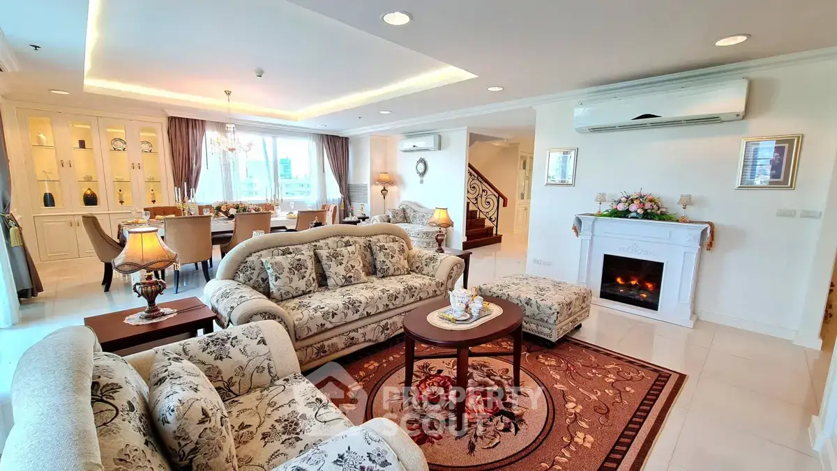 Luxurious living room with elegant decor and spacious dining area in a modern home.