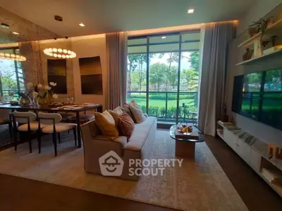 Luxurious living room with modern decor and large windows overlooking a lush garden view.