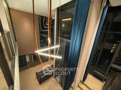 Luxurious modern living room with high ceilings and elegant lighting