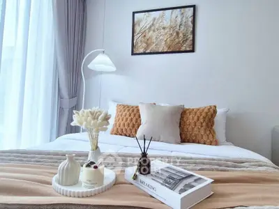Elegant bedroom with cozy decor, featuring soft lighting and stylish accents for a serene ambiance.