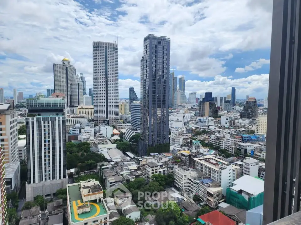 Stunning cityscape view showcasing modern skyscrapers and urban landscape under a vibrant blue sky.