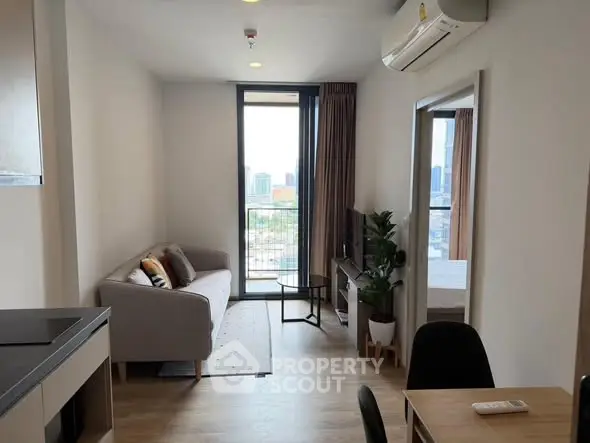 Modern apartment living room with city view and stylish decor