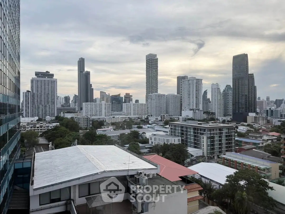 Stunning cityscape view from a high-rise building showcasing modern urban skyline.
