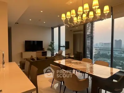 Luxurious living room with panoramic city view and elegant dining area