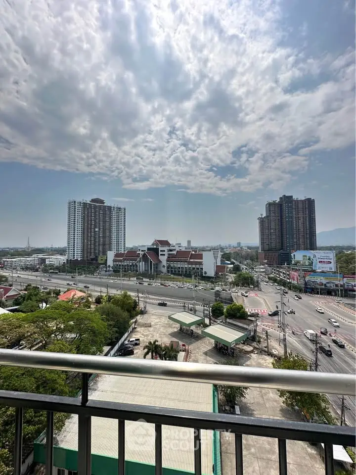 Stunning cityscape view from a high-rise balcony showcasing urban living and skyline.