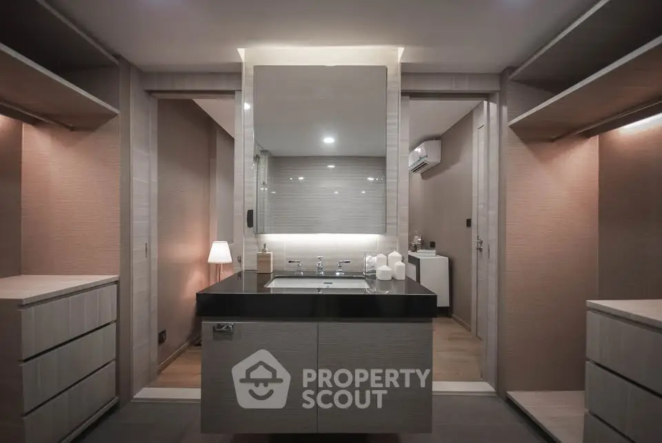 Luxurious modern bathroom with sleek vanity and ambient lighting