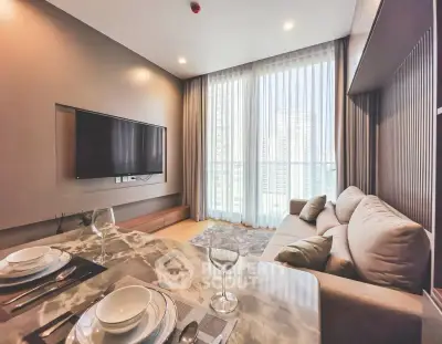 Modern living room with large window and stylish decor in a high-rise apartment.