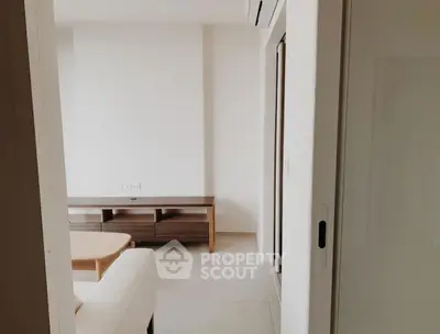 Minimalist living room with modern furniture and neutral tones