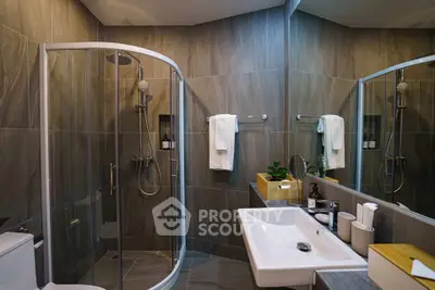 Modern bathroom with glass shower and sleek design