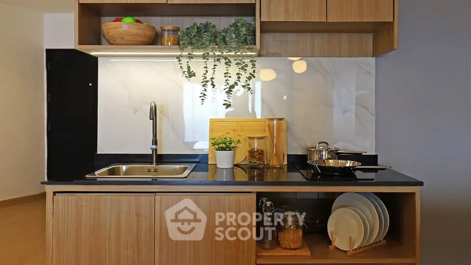 Modern kitchen with sleek wooden cabinets and stylish backsplash