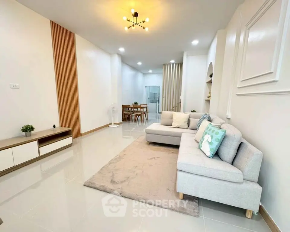 Modern living room with stylish decor and cozy seating area