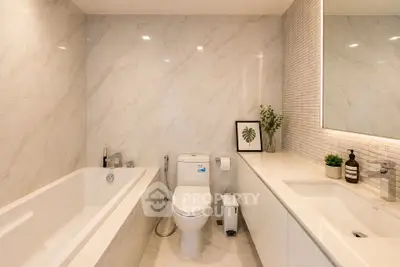 Luxurious modern bathroom with elegant marble tiles and sleek fixtures