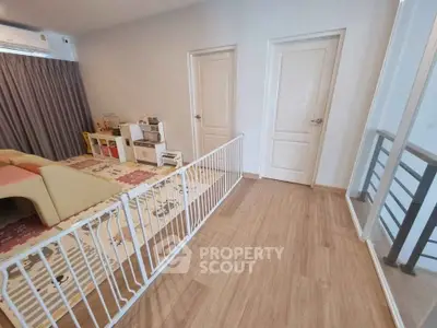 Spacious living area with child-friendly play zone and modern decor