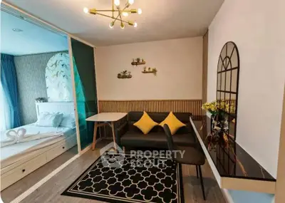 Stylish modern living room with elegant decor and cozy bedroom view