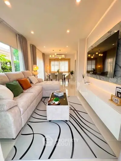 Luxurious modern living room with elegant decor and spacious layout, perfect for relaxation and entertainment.