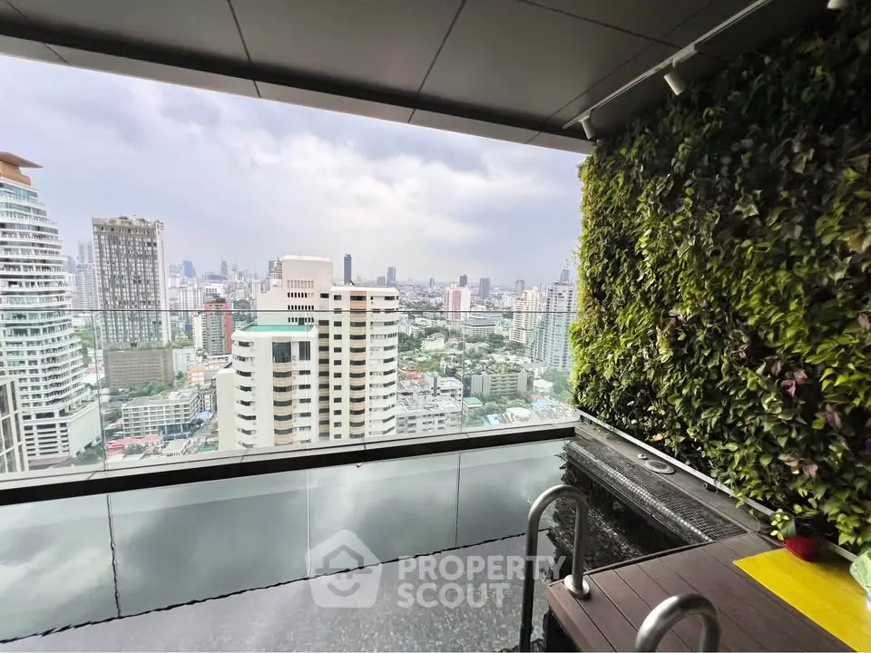 Luxurious rooftop pool with stunning city view and vertical garden