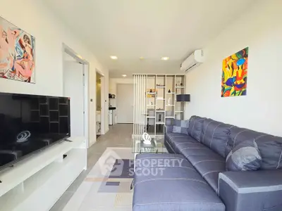 Modern living room with stylish decor and spacious seating area