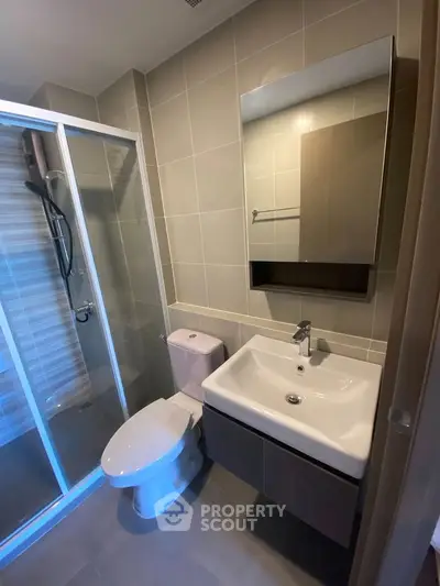 Modern bathroom with sleek shower and contemporary fixtures