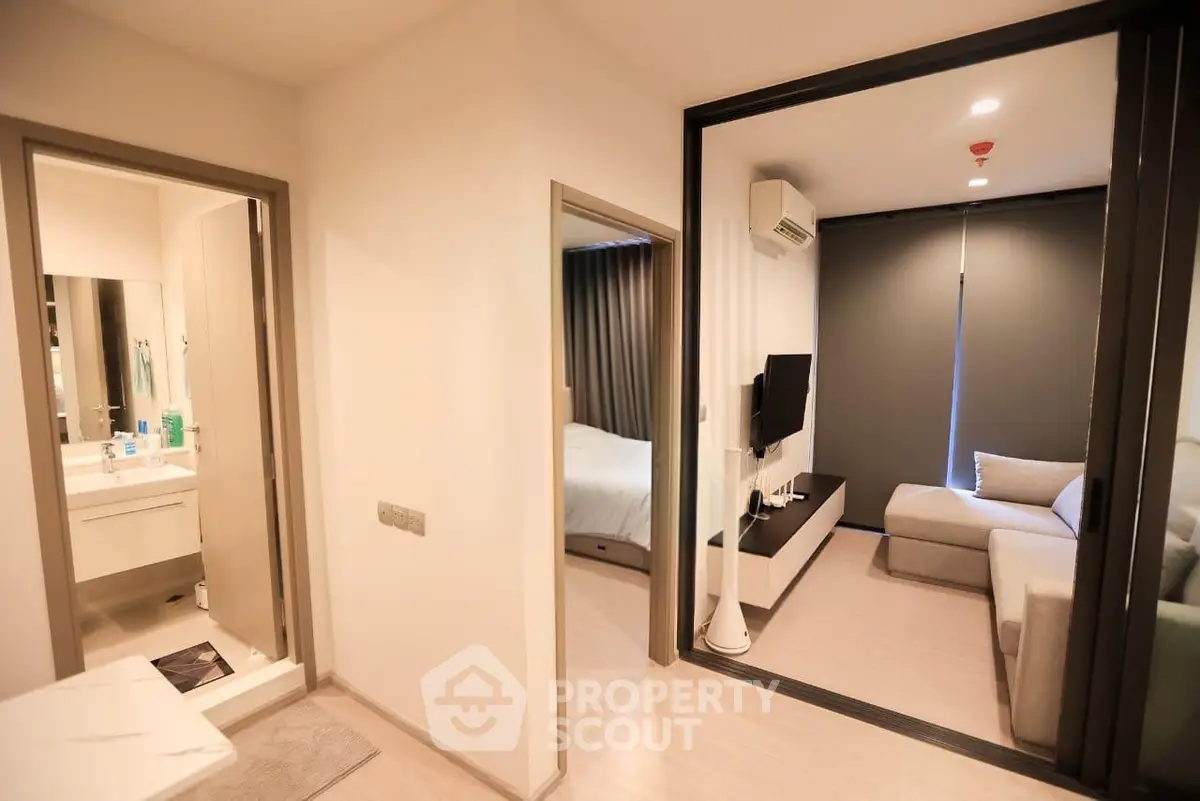 Modern apartment interior with cozy living room and bedroom