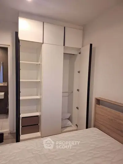 Spacious bedroom with built-in wardrobe and modern design