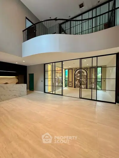 Luxurious modern living room with high ceilings and elegant design